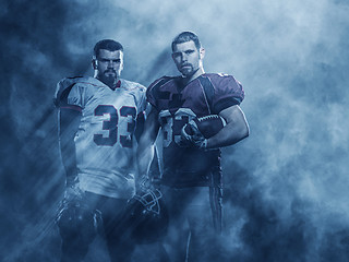 Image showing portrait of confident American football players