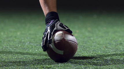 Image showing American football player starting football game