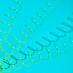 Image showing Stretching plastic springs with shadows.