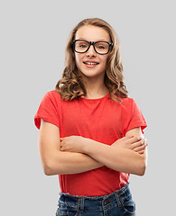 Image showing smiling student girl in glasses and red t-shirt