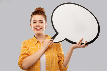Image showing red haired teenage girl holding speech bubble