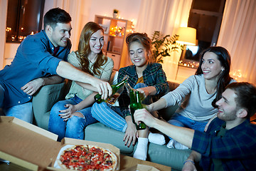 Image showing happy friends with drinks and pizza party at home