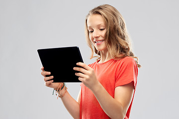 Image showing smiling teenage girl with tablet computer