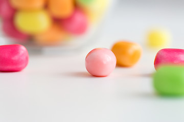 Image showing close up of candy drops over white background