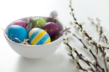 Image showing colored easter eggs and pussy willow branches