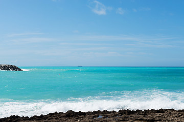 Image showing Beautiful azure sea and the rocky beach