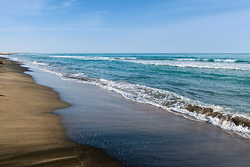 Image showing Beautiful sea and the black sandy beach,