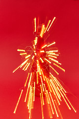 Image showing Shined trails of Christmas garland lights as a firework.