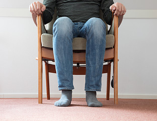 Image showing Man in armchair, slightly creepy 