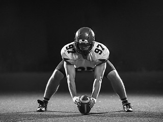 Image showing American football player starting football game