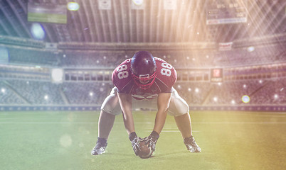 Image showing American football player starting football game