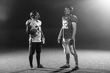 Image showing portrait of confident American football players