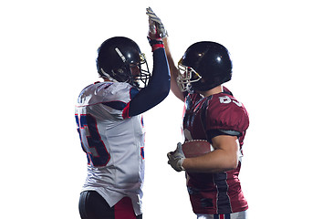 Image showing american football players celebrating after scoring a touchdown