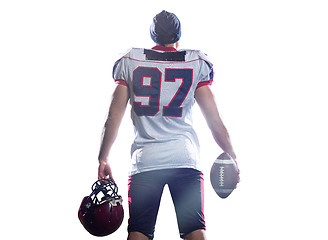 Image showing rear view of young confident American football player