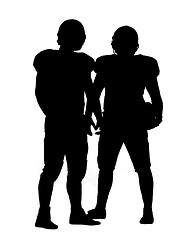 Image showing Two American football players standing  on the field