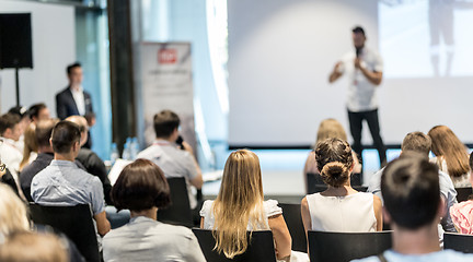 Image showing Male business speaker giving a talk at business conference event.