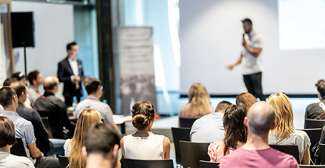 Image showing Male business speaker giving a talk at business conference event.