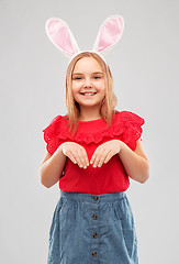 Image showing happy girl wearing easter bunny ears headband