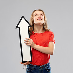 Image showing smiling teenage girl with arrow showing direction