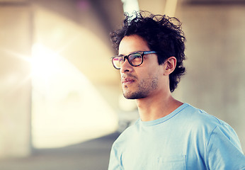 Image showing man in eyeglasses on city street