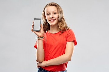 Image showing smiling teenage showing smartphone