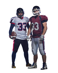 Image showing Two American football players standing  on the field