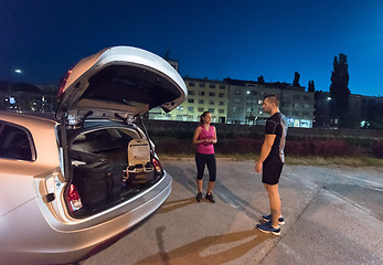 Image showing couple warming up and stretching