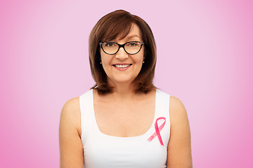 Image showing old woman with pink breast cancer awareness ribbon