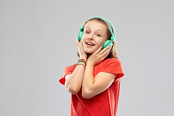 Image showing happy teenage girl with headphones