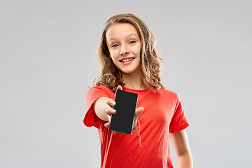 Image showing smiling teenage showing smartphone