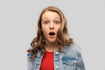 Image showing surprised or shocked teenage girl in red t-shirt