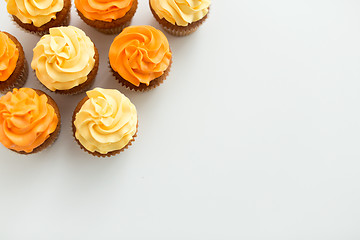 Image showing cupcakes with frosting on white background