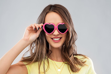 Image showing teenage girl in heart-shaped sunglasses