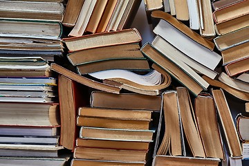 Image showing Wall of books piled up