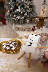 Image showing Marshmallow snowman float in hot chocolate at Christmas