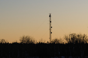 Image showing Telecommunication mast by sunset