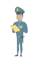Image showing Young policeman in uniform writing on clipboard.