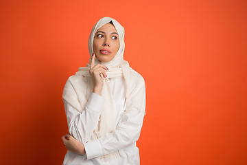 Image showing The arab woman in hijab. Portrait of serious girl, posing at studio background