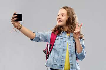 Image showing teenage student girl taking selfie by smartphone