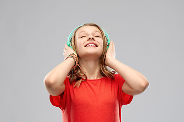 Image showing happy teenage girl with headphones