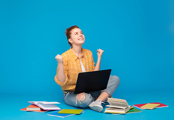 Image showing happy student girl with laptop celebrating success