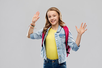 Image showing happy smiling teenage student girl with school bag