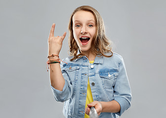 Image showing teenage girl taking picture by selfie stick