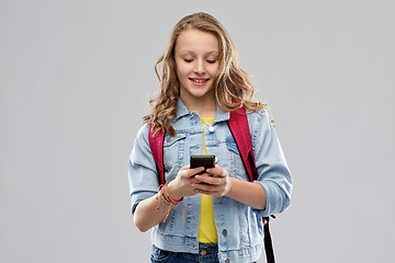 Image showing teen student girl with school bag and smartphone