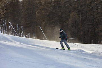 Image showing Skiing in the winter snowy slopes