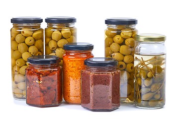 Image showing Olives, pesto, dried tomatoes on white background