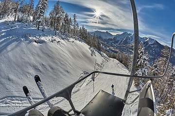 Image showing Ski slopes in the mountains, chairlift