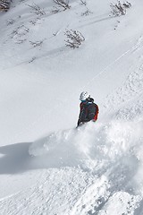 Image showing Snowboarding in deep snow free ride