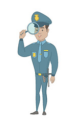 Image showing Young hispanic detective with magnifying glass.