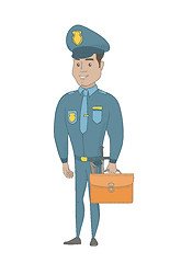 Image showing Young hispanic policeman holding a briefcase.